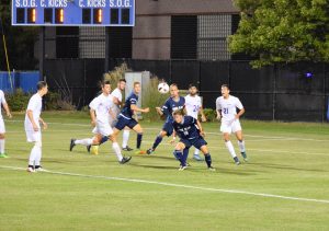 Anna Meassick | Sophomore Emil Jesman Sunde goes for a header as both teams desperately try to break the tie