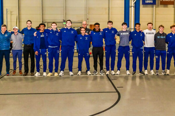 The men’s track & field team honors their seniors at Mackal Field House. PHOTO CREDIT: Michael Scott | GoRhody.com