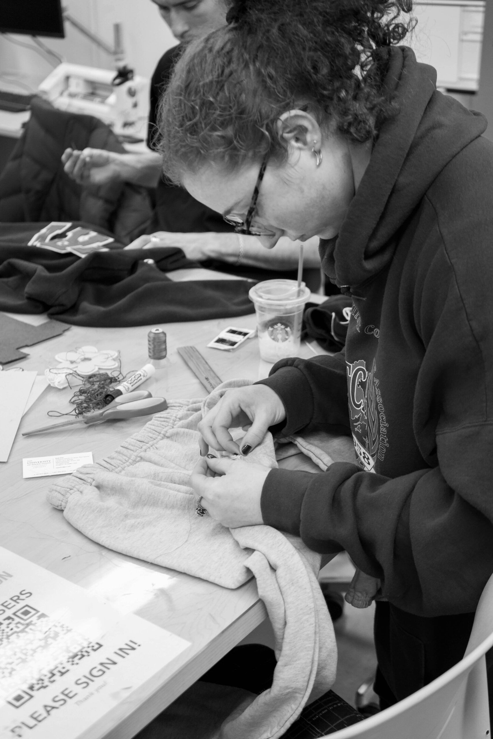 Students gather in the MakerSpace to drink tea and mend clothes. PHOTO CREDIT: Aidan Cahill | Contributing Photographer