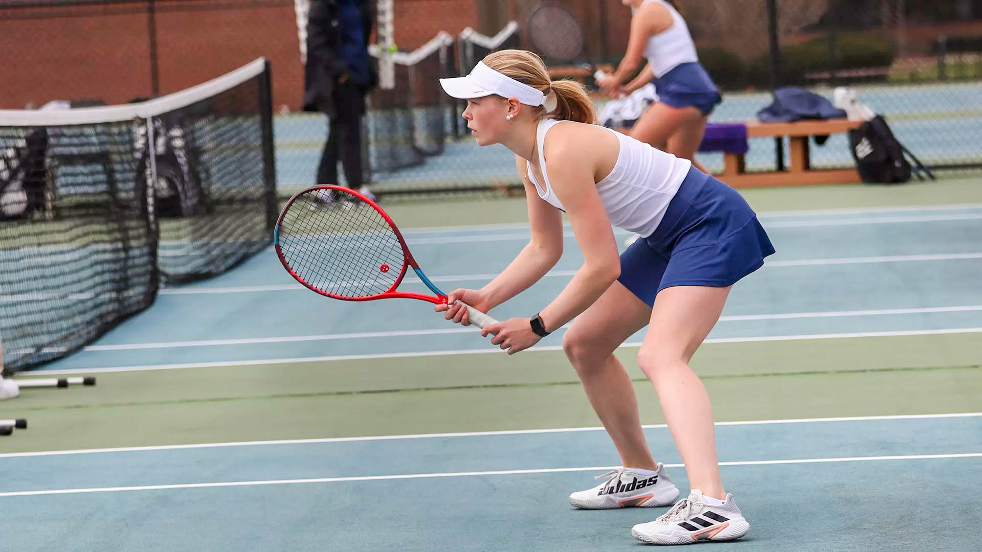 Fourth-year Klara Nelander wins both singles and doubles in URI’s victory over Hofstra on Feb. 16. PHOTO CREDIT: Michaela Benford / GoRhody.com