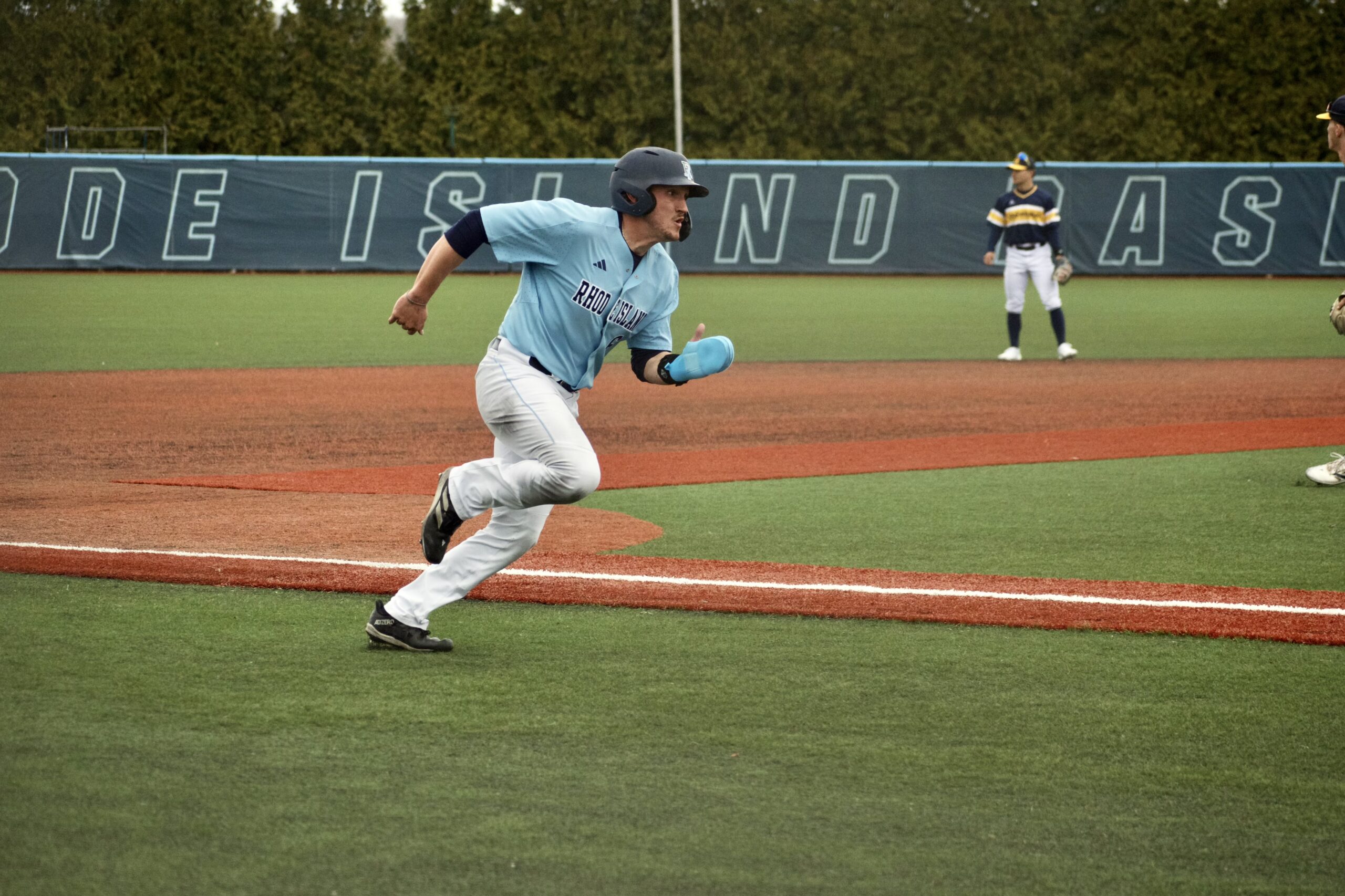 Sixth-year infielder DJ Perron hits a home run and four RBIs, leading to URI’s win over Oregon on Friday. PHOTO CREDIT: Nora Kelley | Photo Editor