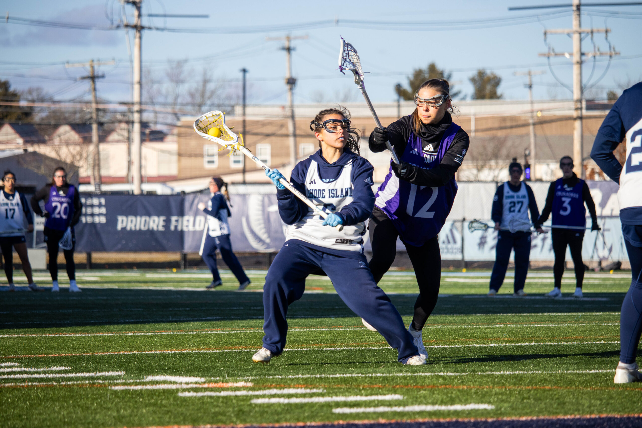 The University of Rhode Island women’s lacrosse team made its Division I debut on Saturday afternoon in a home scrimmage against the College of the Holy Cross.