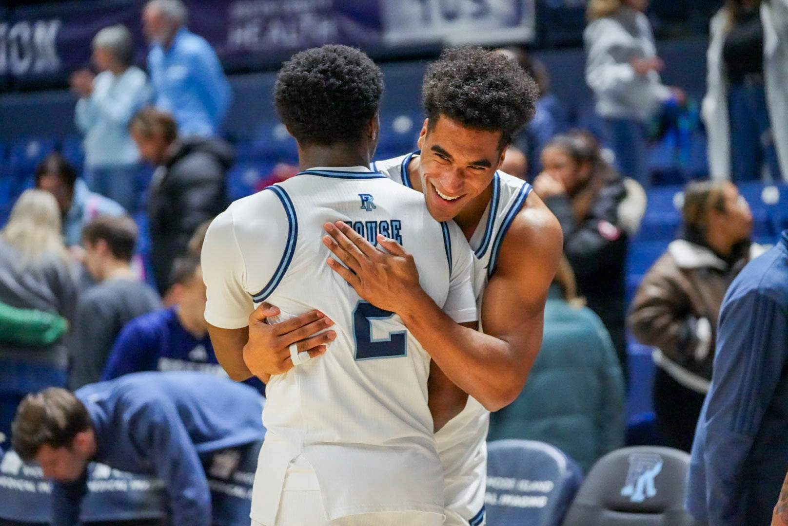 Second-year forward David Fuchs embraces fourth-year guard Jaden House. PHOTO CREDIT: Emma Roberts | Staff Photographer