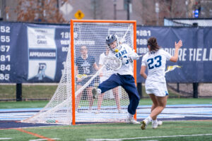 Fifth-year goalie Casey Phelps reaches 100 saves on season against George Washington University on Wednesday. PHOTO CREDIT: Nora Kelley | Photo Editor