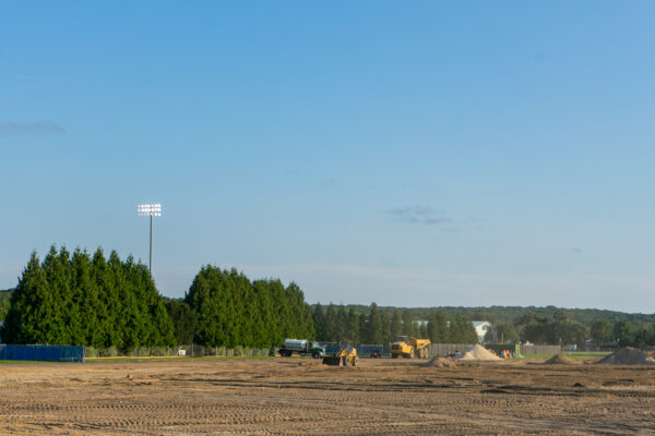 Construction is underway at the new outdoor track complex that’s located between the soccer and softball fields. PHOTO CREDIT: Aidan Cahill | Contributing Photographer