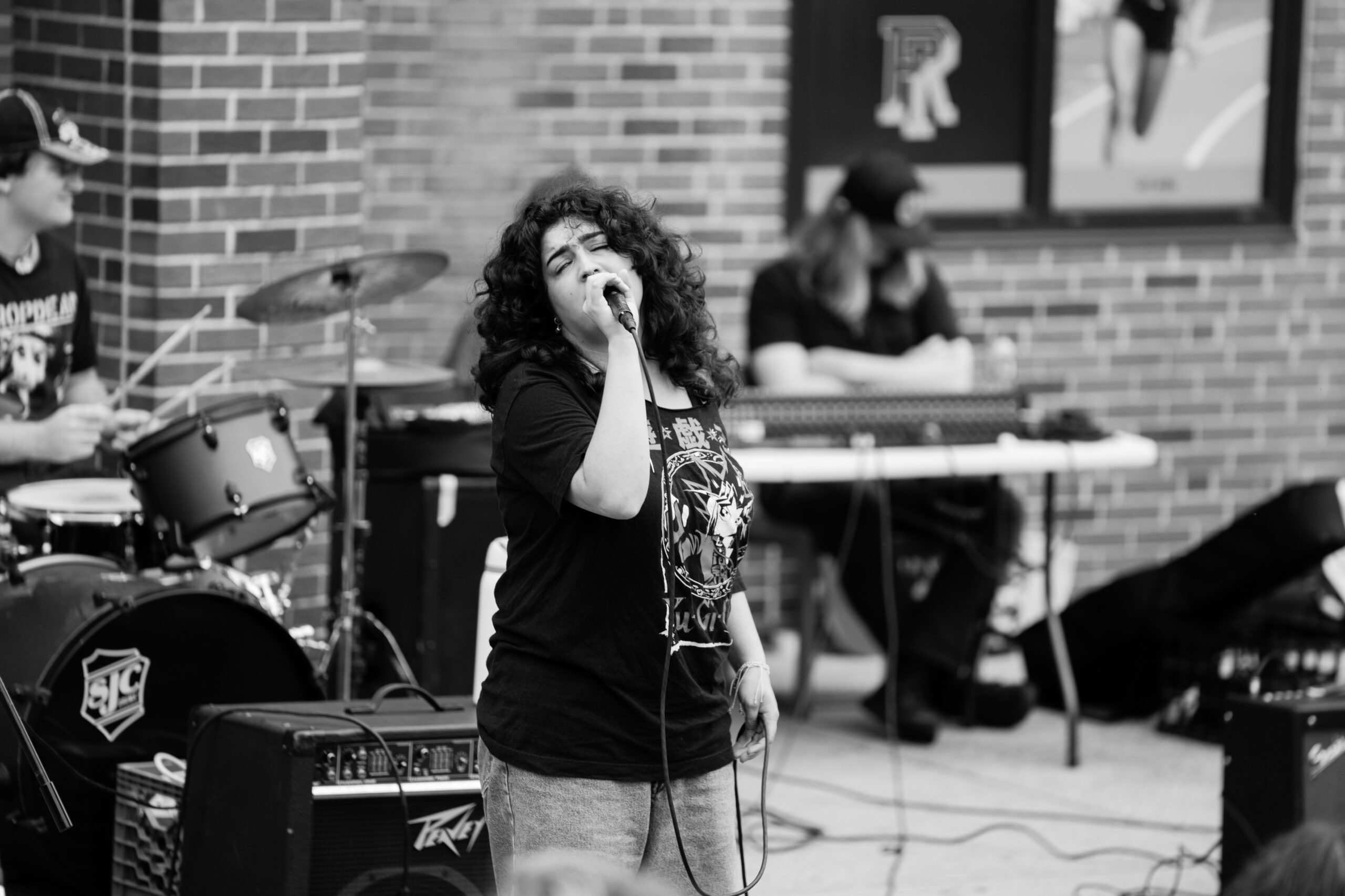 Nina Lima performs with Kidnapped at AwesomerFest on Saturday. PHOTO CREDIT: Emma Roberts | Staff Photographer