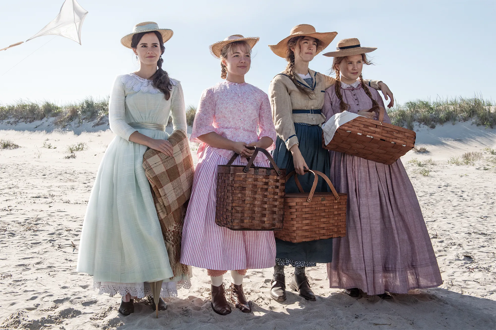 Meg (Emma Watson), Amy (Florence Pugh), Jo (Saoirse Ronan) and Beth (Eliza Scanlen) gaze off into the distance on a beach. PHOTO CREDIT: IMDB.com